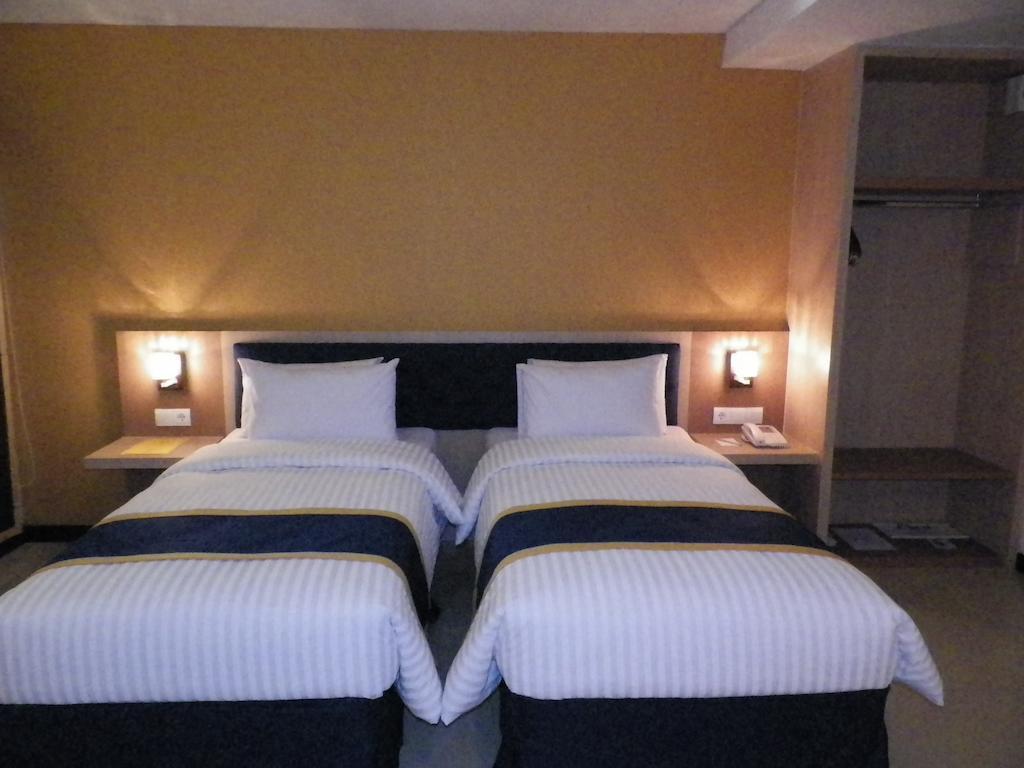 D'Best Hotel Pasar Baru Bandung Habitación foto