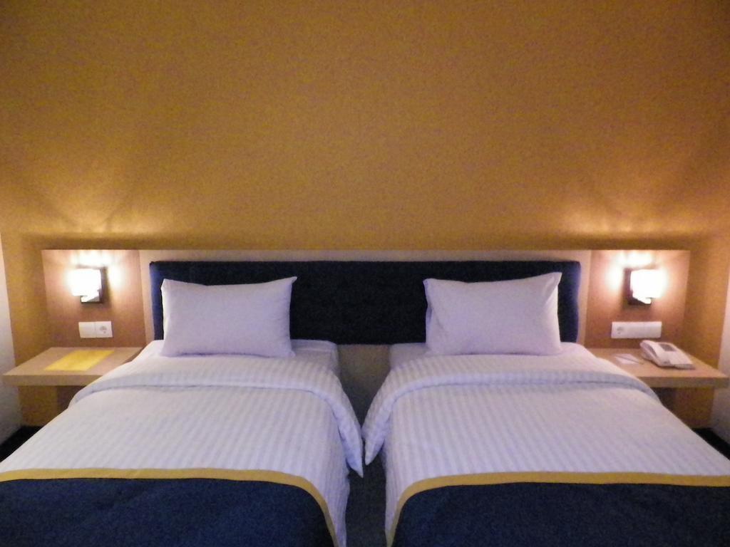 D'Best Hotel Pasar Baru Bandung Habitación foto